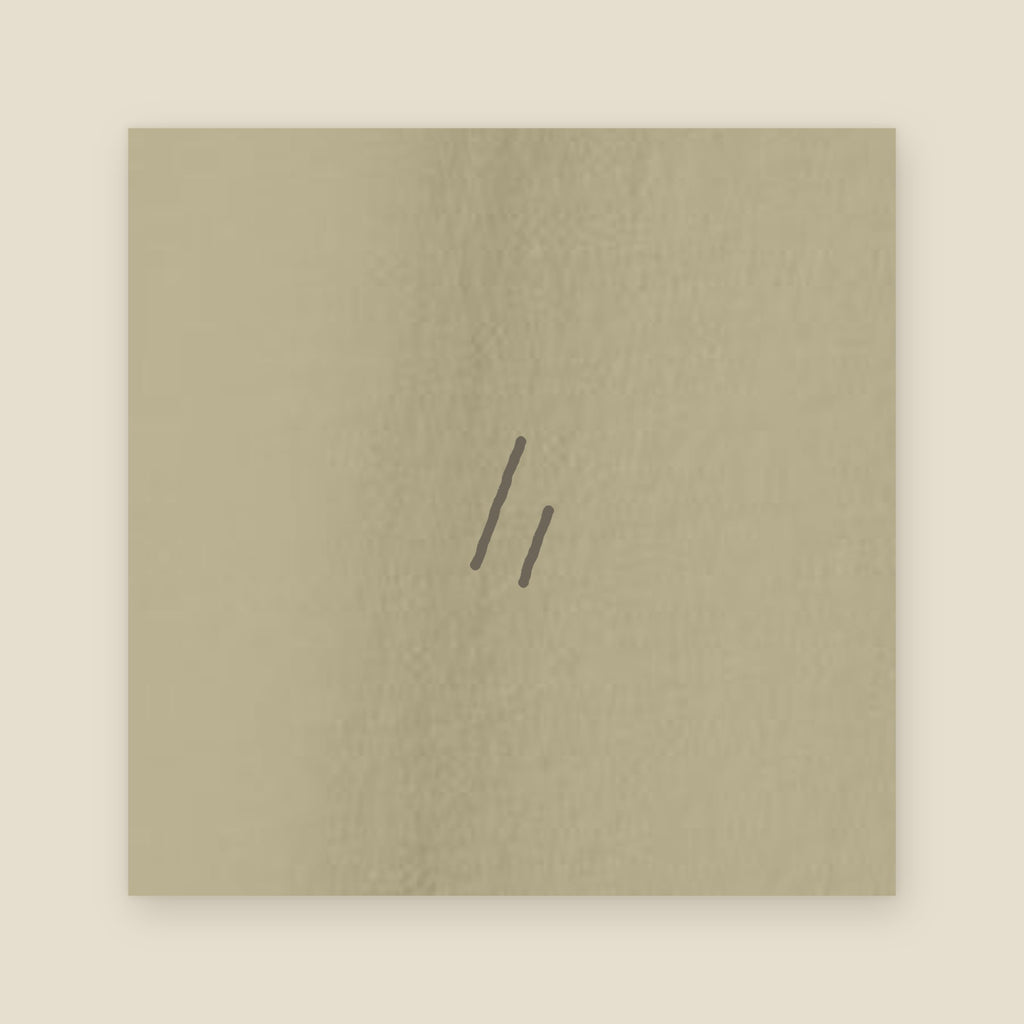 125 Steps Tee, mark artwork on a Prairie Path (Khaki) fabric swatch: the mark, printed in tone, right sleeve.