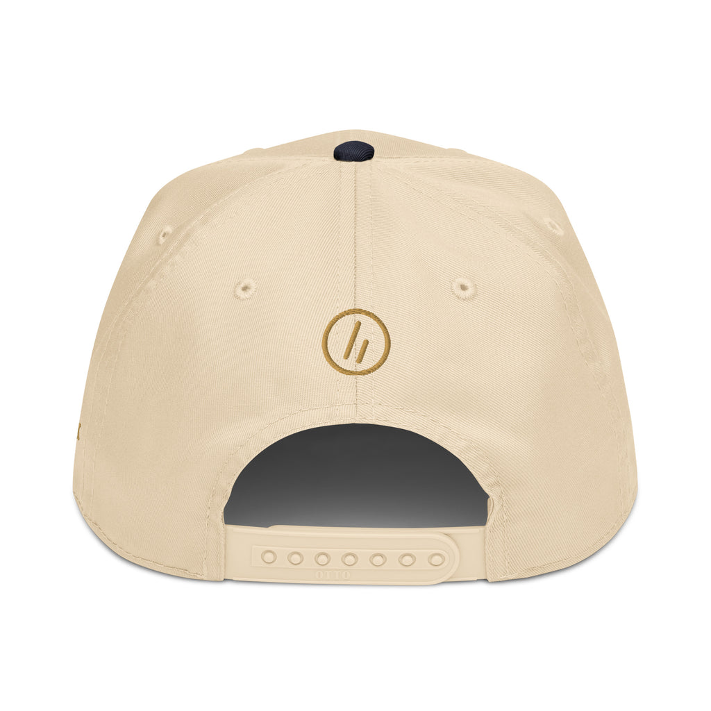 Mayvick structured cap, Navy/Natural, back: Old Gold stitched roundel symbol above the closure