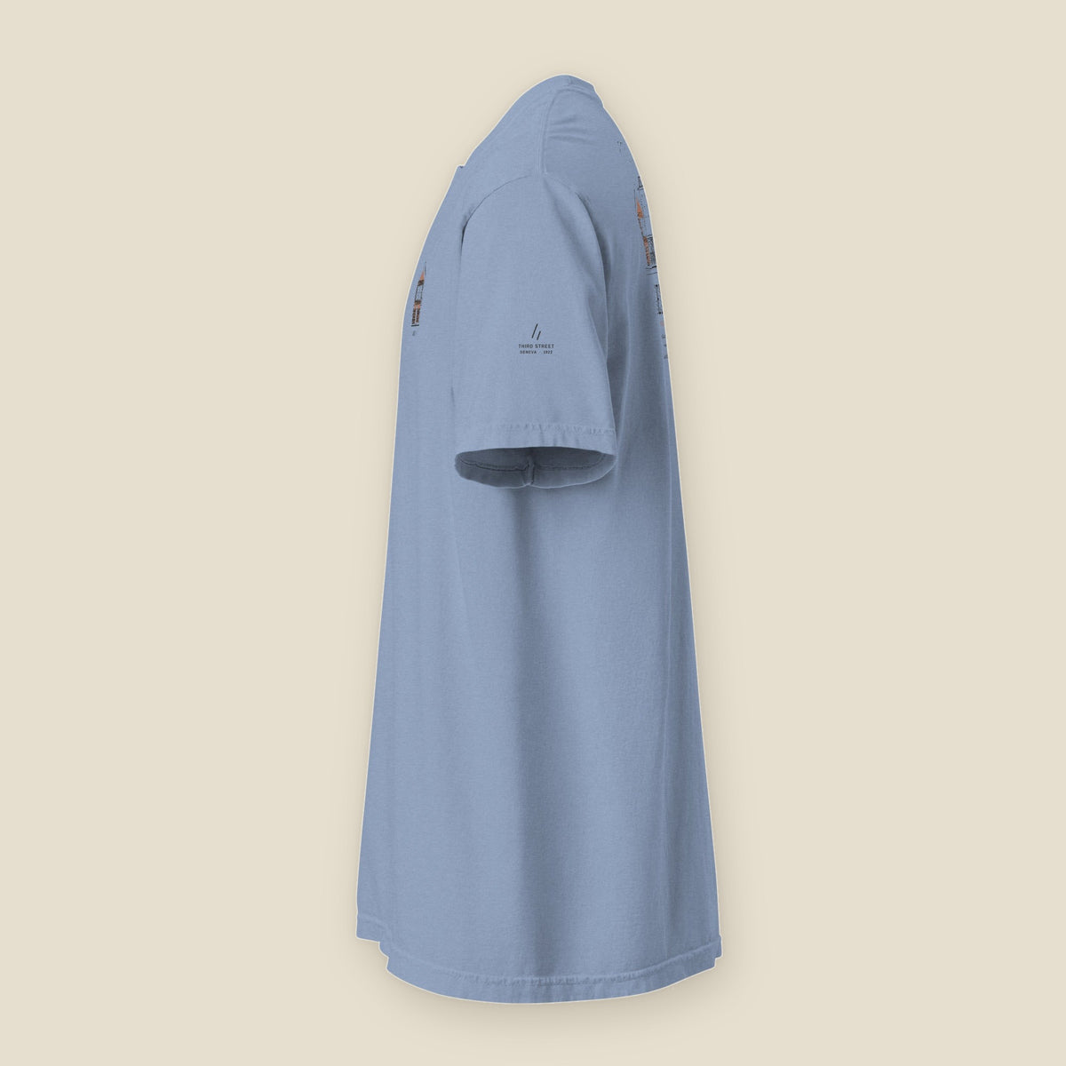 Geneva Tee, left side, Washed Denim: THIRD STREET on the sleeve and the edge of the back print