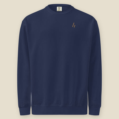 Chain O'Lakes Crewneck, front, True Navy: the double slanted line mark printed in gold at the left chest