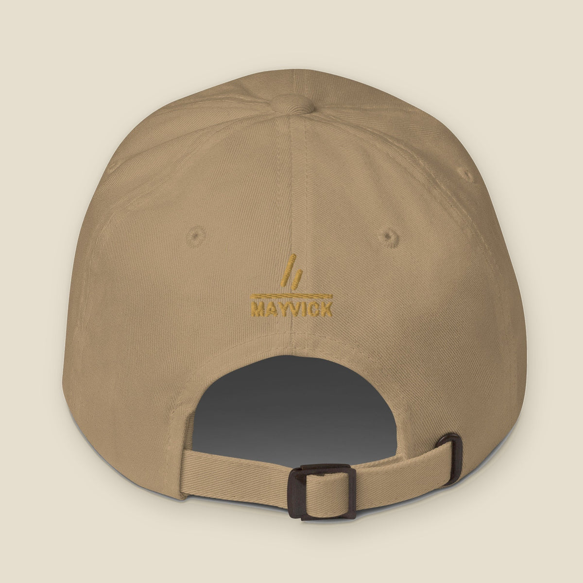 Dipped Dad Hat (Khaki), back, Khaki: the double slanted line mark over MAYVICK in Old Gold, above the strap.