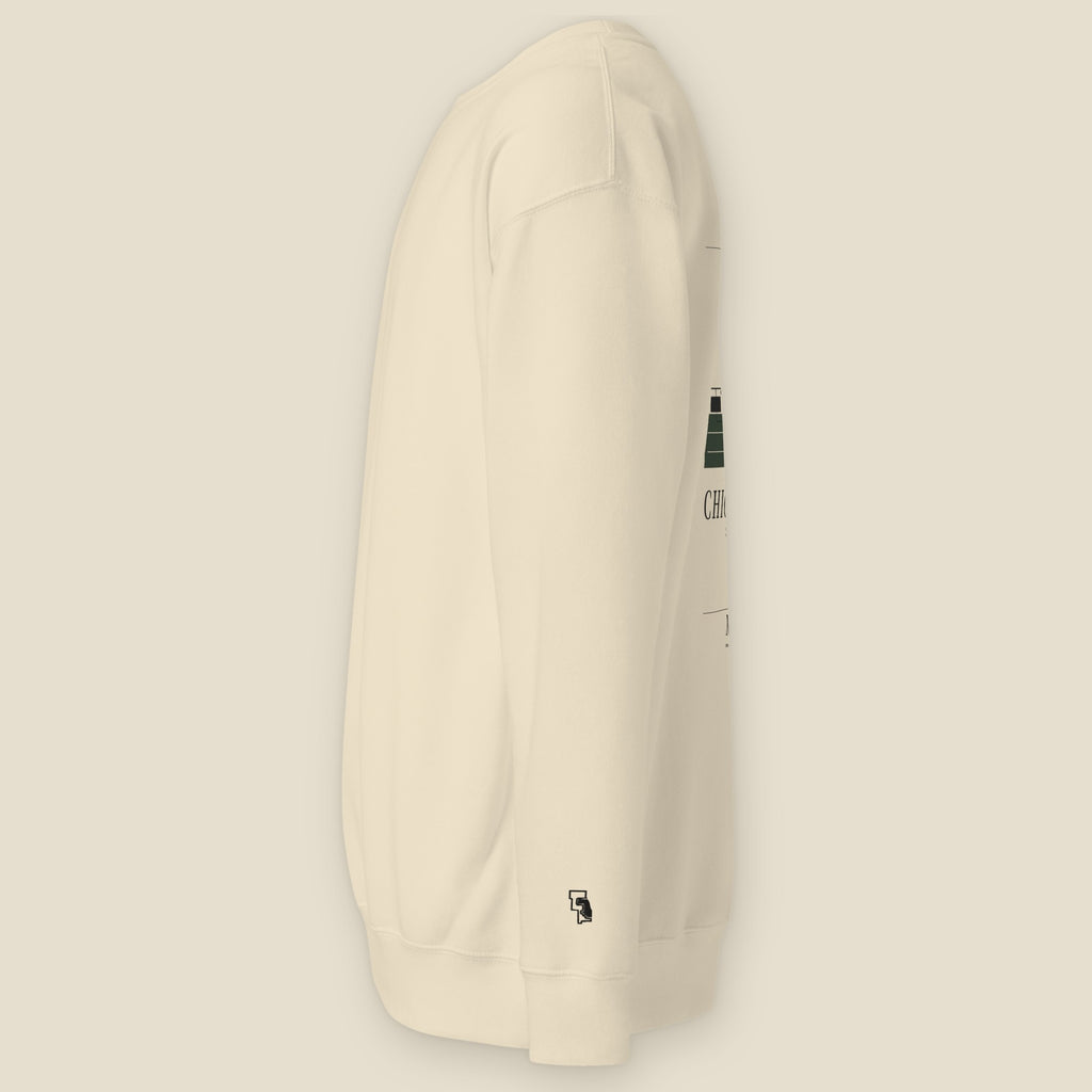 Green River Crewneck, left side, Bone: the six-county ring stitched small at the left wrist.