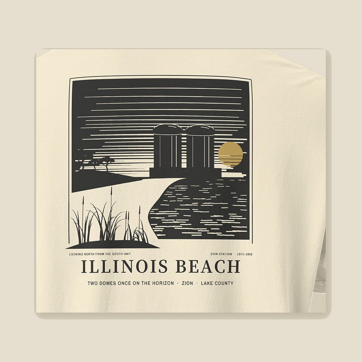 Illinois Beach Tee, back close-up: Zion Station's two domes, a low sun over the lake and marram grass