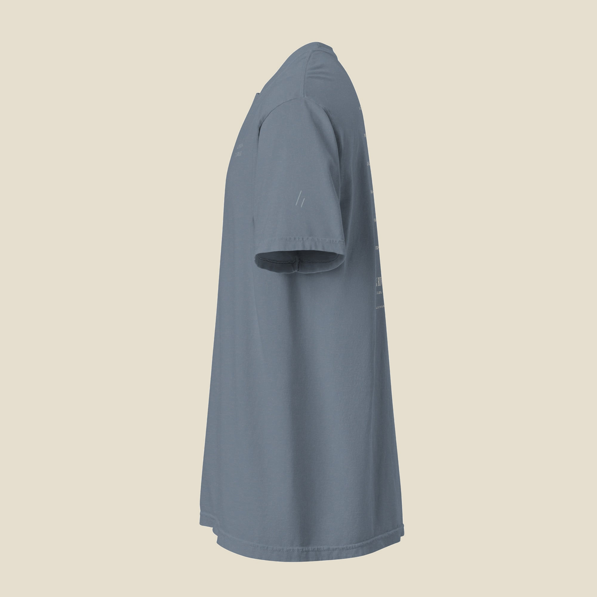 Fox River Trail Tee, left side, Blue Jean: the double slanted line mark stitched on the upper sleeve.
