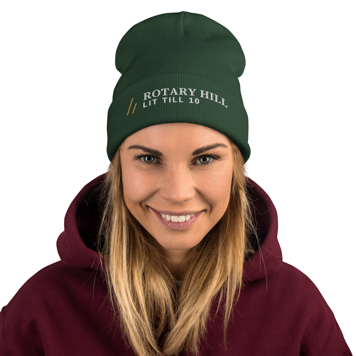 Rotary Hill Beanie, worn, front, Dark Green: ROTARY HILL over LIT TILL 10 in white, the mark in Old Gold