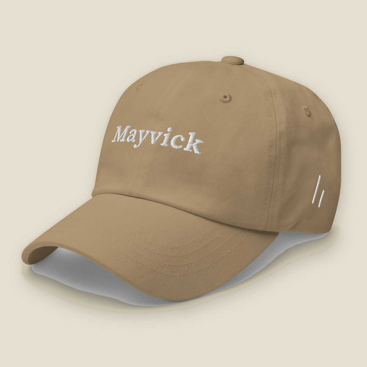 Mayvick Dad Cap, front-left, Khaki: the white wordmark and the double slanted line mark on the side.