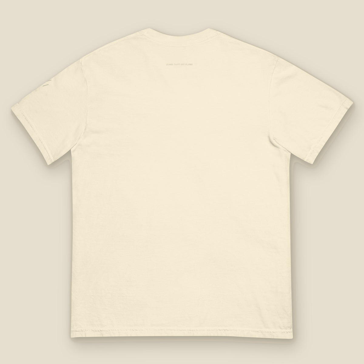 Niles Tee, back, Lemont Stone (Ivory): LEANS 7.4 FT OFF PLUMB printed tone on tone at the yoke.
