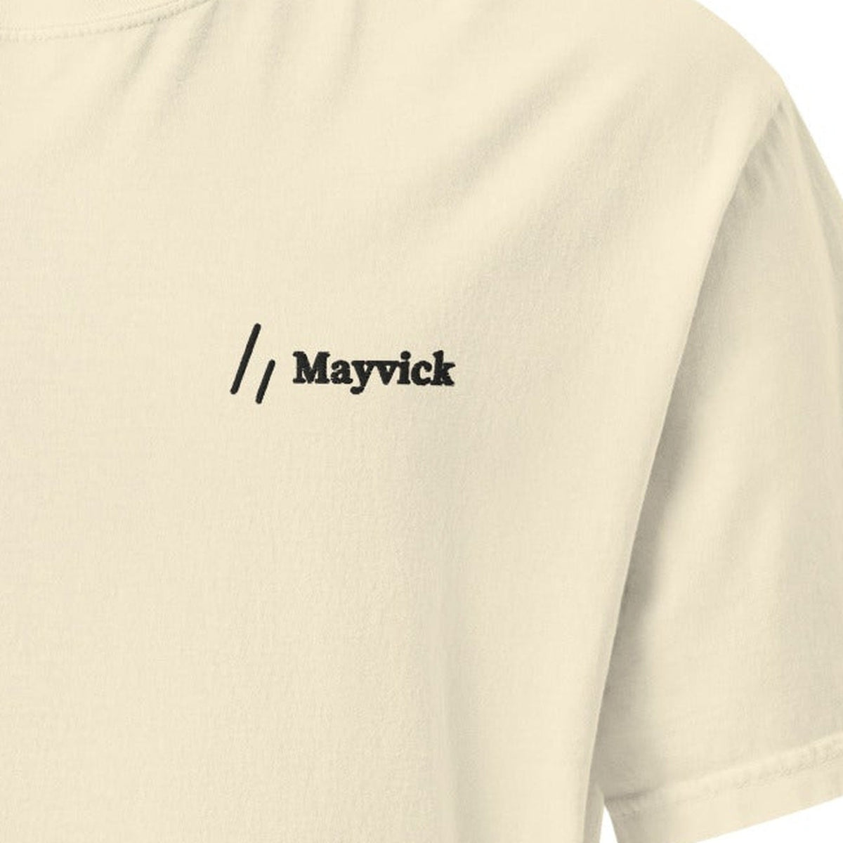 Stitched Tee, chest close-up, Ivory: the double slanted line mark and Mayvick stitched in black.