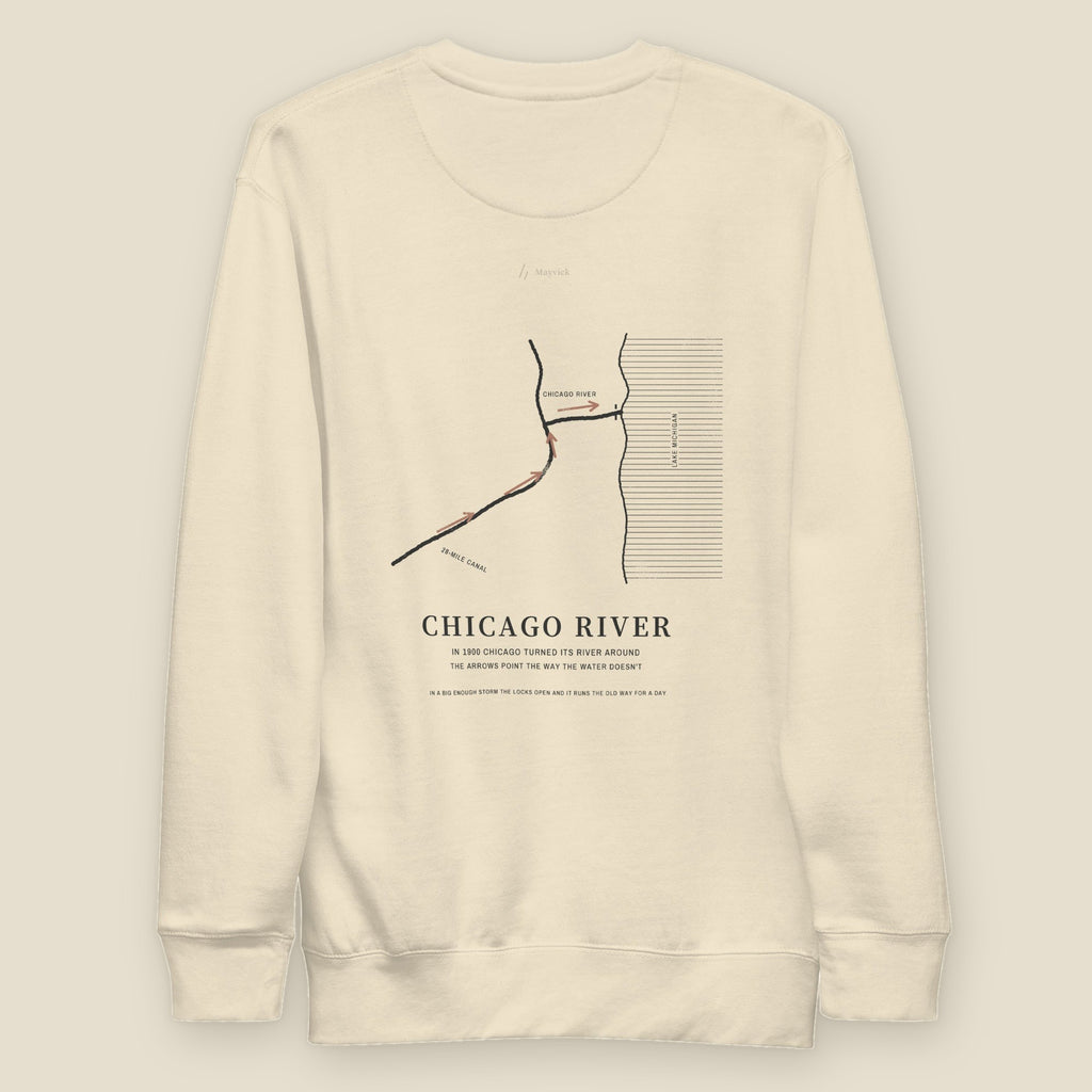 The Reversal Crewneck, back, Lemont Stone (Bone): a plan map of the Chicago River, arrows toward the lake.