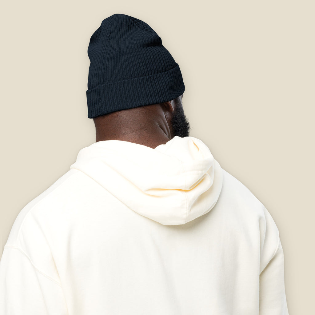 Two to Four Beanie, worn, back, Oxford Navy: plain ribbed back of the beanie