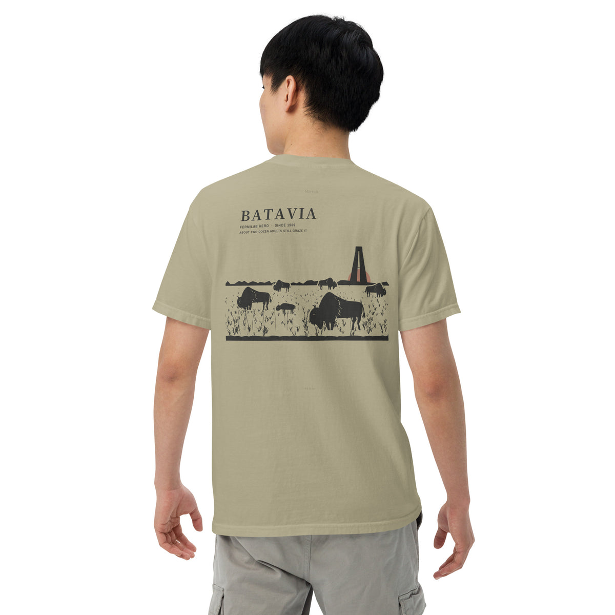 The Herd Tee, back on a model, Prairie Path (Khaki): six bison on the prairie, BATAVIA top left.