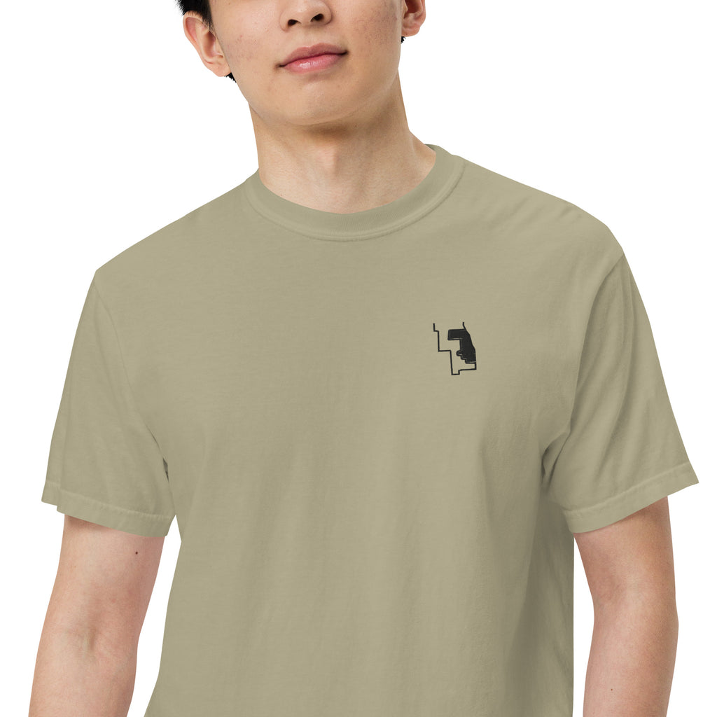 Prairie Path (Khaki) heavyweight tee, on model, close-up: chest mark
