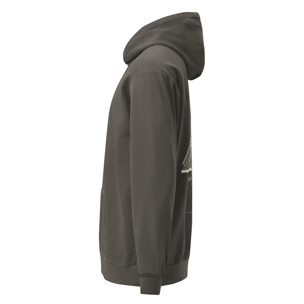 Left side: Pepper hoodie with the edge of the back roller coaster print behind the sleeve